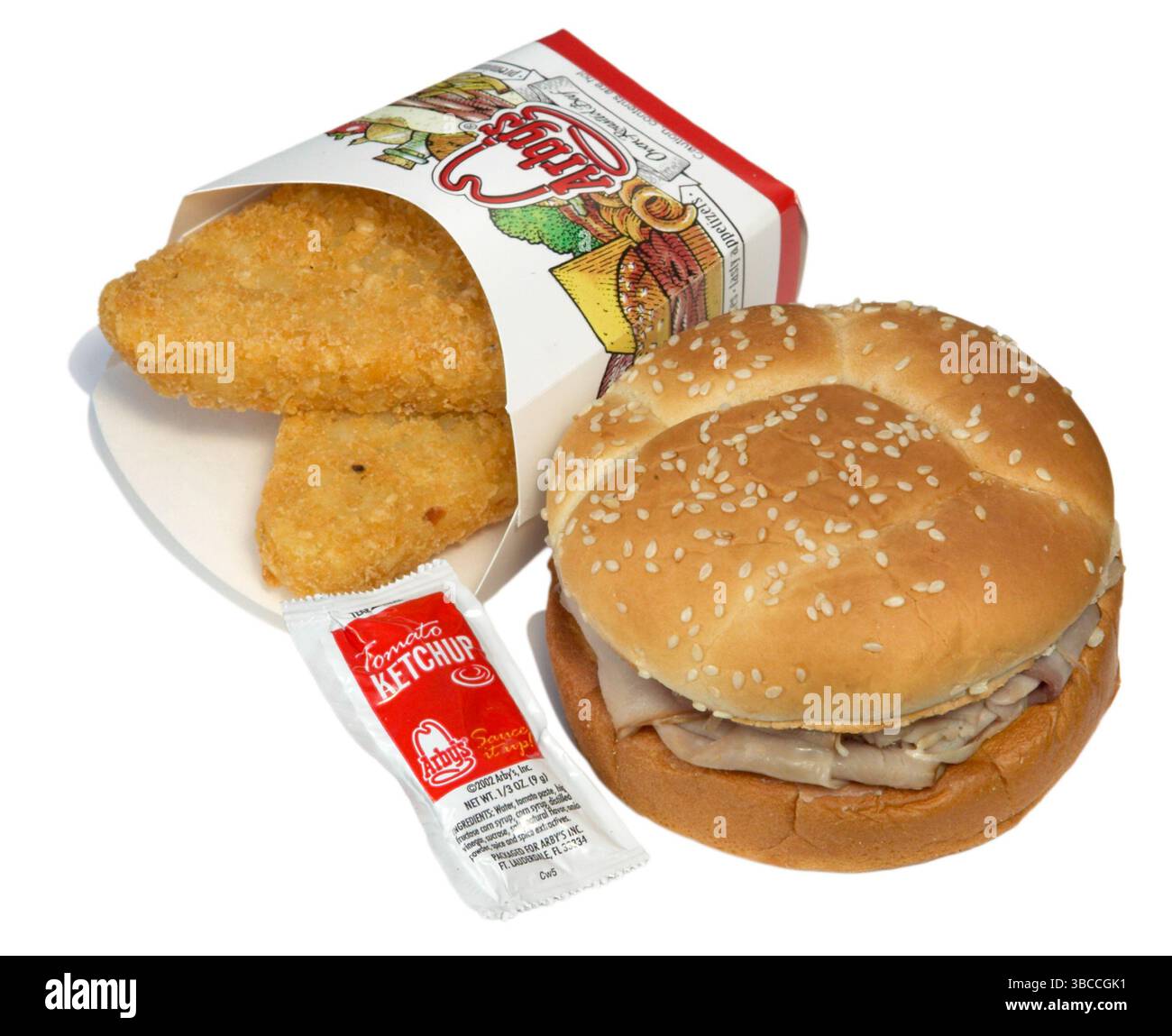 arby's Schinken mit Kartoffelkuchen auf weißem Hintergrund Stockfoto