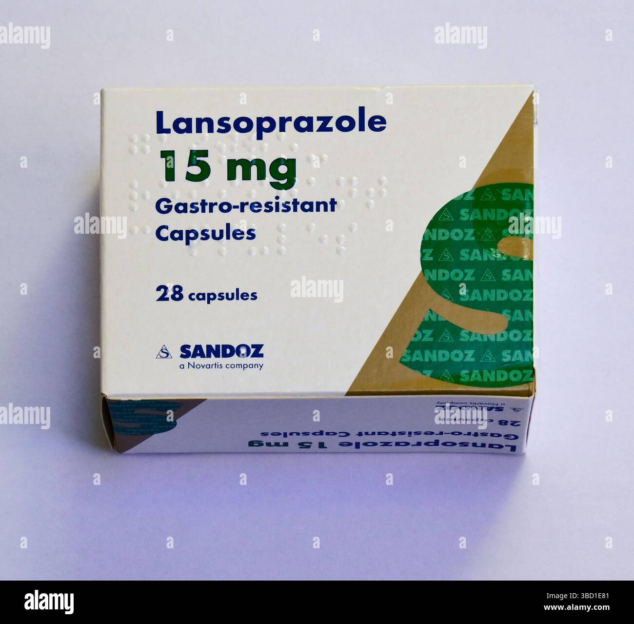 Packung mit Lanzoprazol 15 mg magensaftresistente Kapseln. 28 Kapseln. SANDOZ ist ein Unternehmen von Novartis. Stockfoto