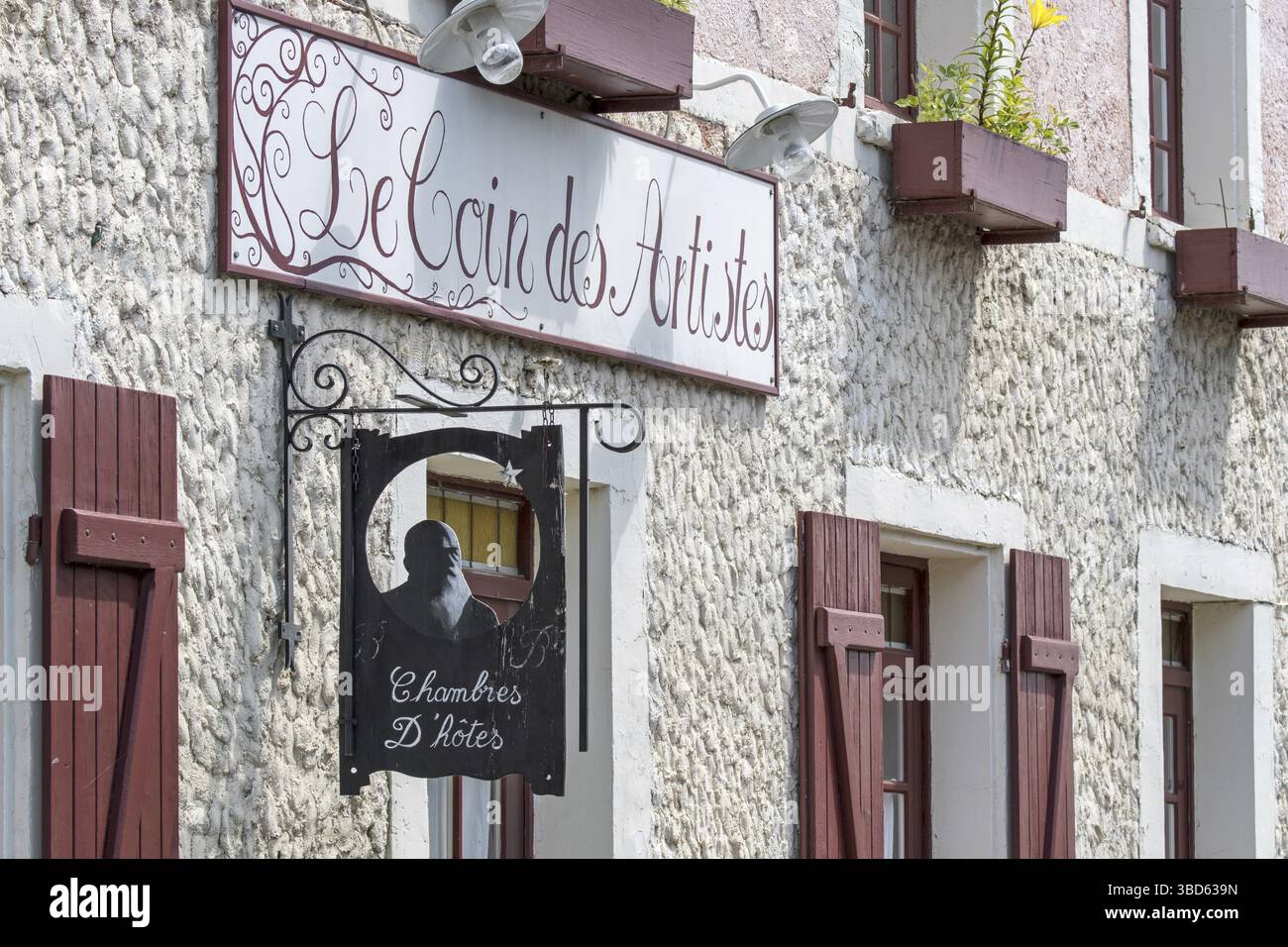 Schild mit der Silhouette des impressionistischen Malers Claude Monet im Le Coin des Artistes, Chambre d'hotes in Giverny, Département Eure, Normandie, Frankreich Stockfoto
