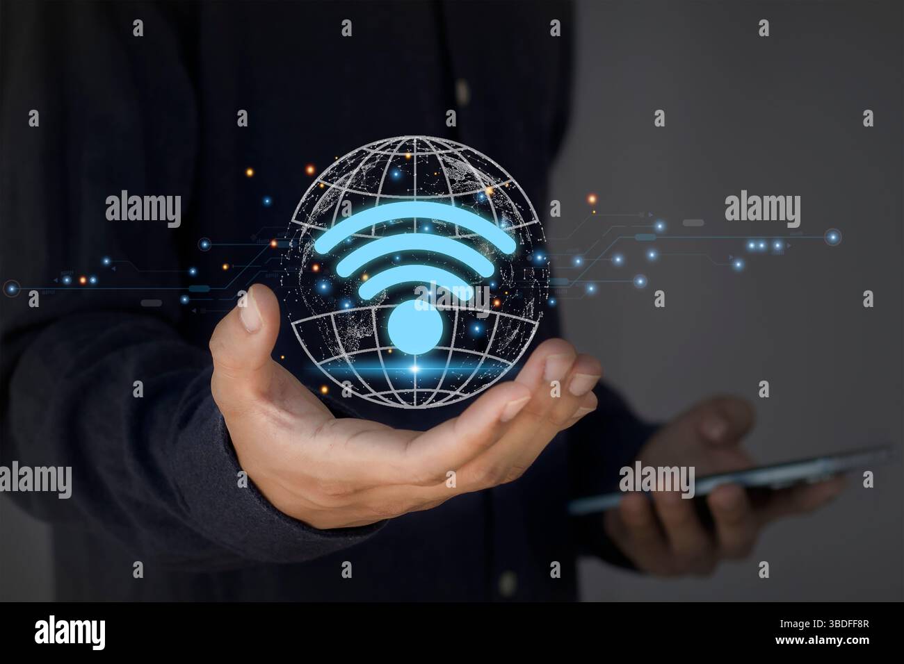 WLAN in der Hand, drahtloses Netzwerk mit Symbolen auf der Hand eines jungen Mannes Stockfoto