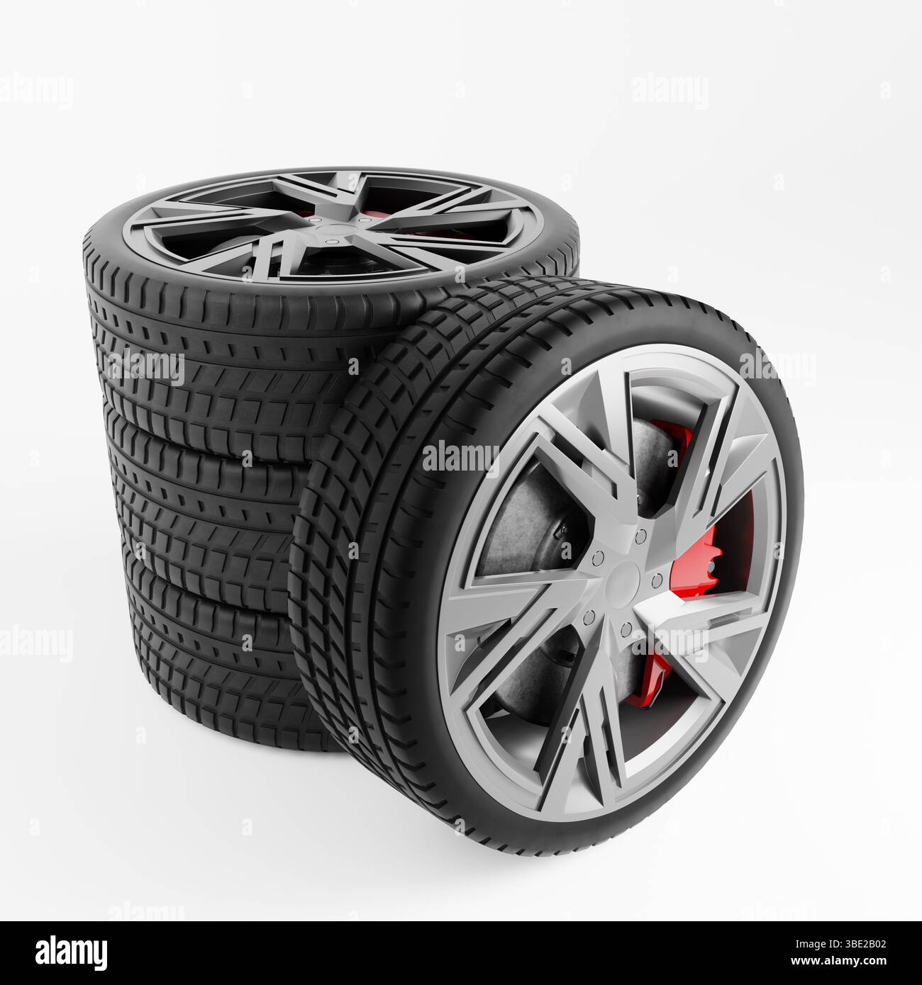 Nahaufnahme der hochleistungsfähigen Autoreifen, die in geordneter Weise gestapelt sind und die komplizierten Laufflächen und markanten Silberfelgen hervorheben Stockfoto