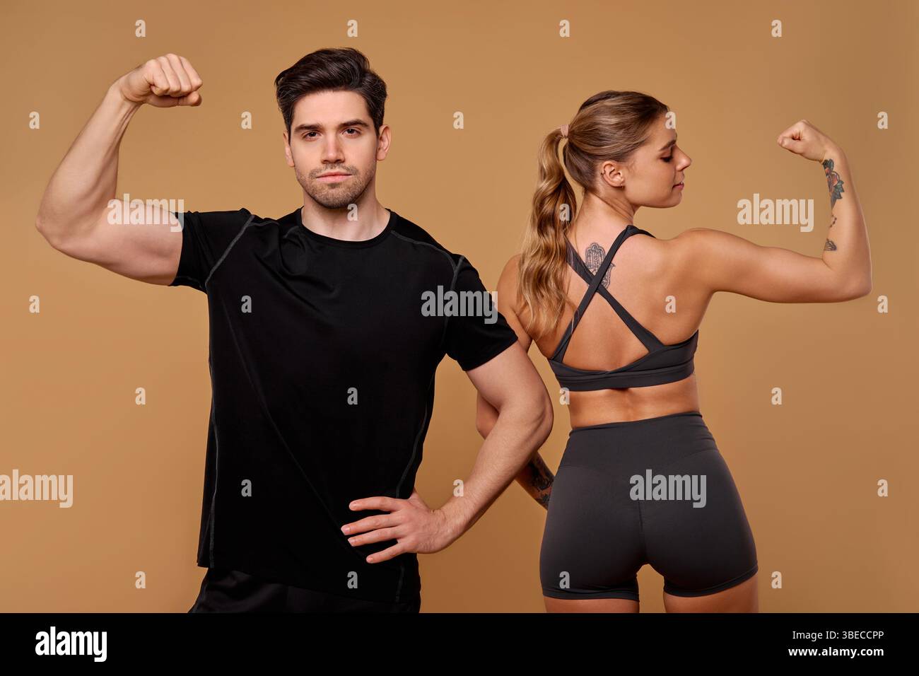 Ein fitter Mann und eine Frau veranschaulichen Stärke und Leichtathletik und inspirieren andere, ihre Gesundheits- und Fitnessziele mit Hingabe und Energie zu verfolgen, Promotin Stockfoto