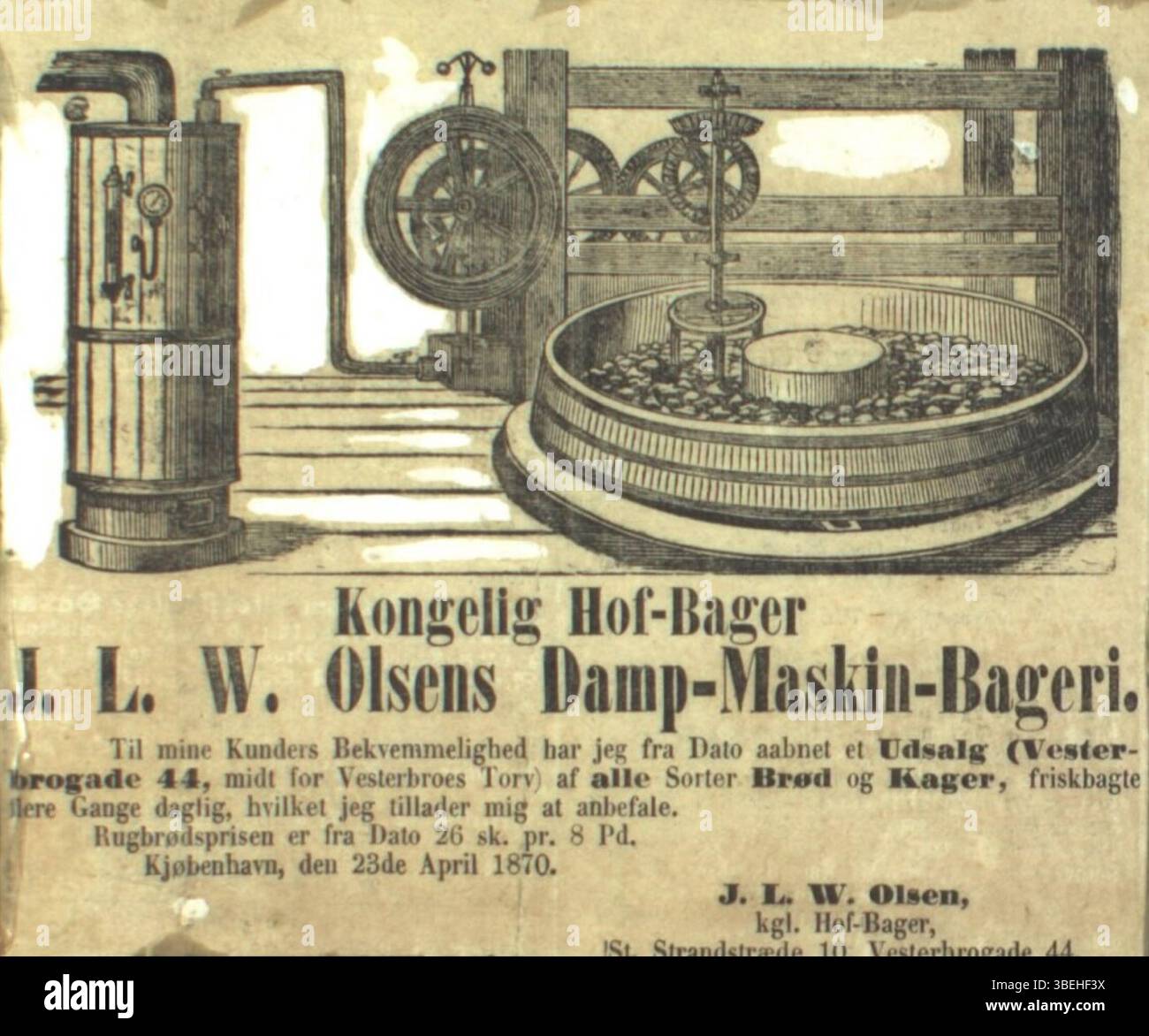 Dieses Foto aus dem späten 19. Oder frühen 20. Jahrhundert zeigt den Store Strandstræde, Nummer 10, wo ein königlicher Bäcker eine Dampfmaschine verwendete. Das Bild spiegelt den technologischen Fortschritt in Bäckereien wider. Stockfoto