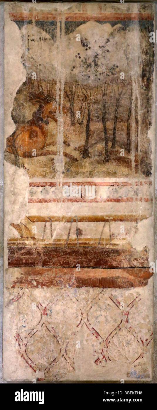 Dieses Wandgemälde „Scène dans la forêt“ aus den Jahren 1350 bis 1399 zeigt ein Tier in einer Waldlandschaft. Das Stück ist Teil der Sammlung des Musée du Petit Palais in Avignon, das mittelalterliche französische Kunstwerke beherbergt, die heute im Musée du Louvre aufbewahrt werden. Stockfoto