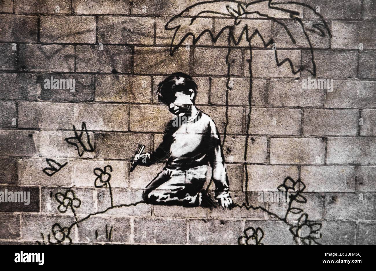 Banksy - Kind malt sich eine Welt der Blumen, Ausstellung The World of Banksy Stockfoto