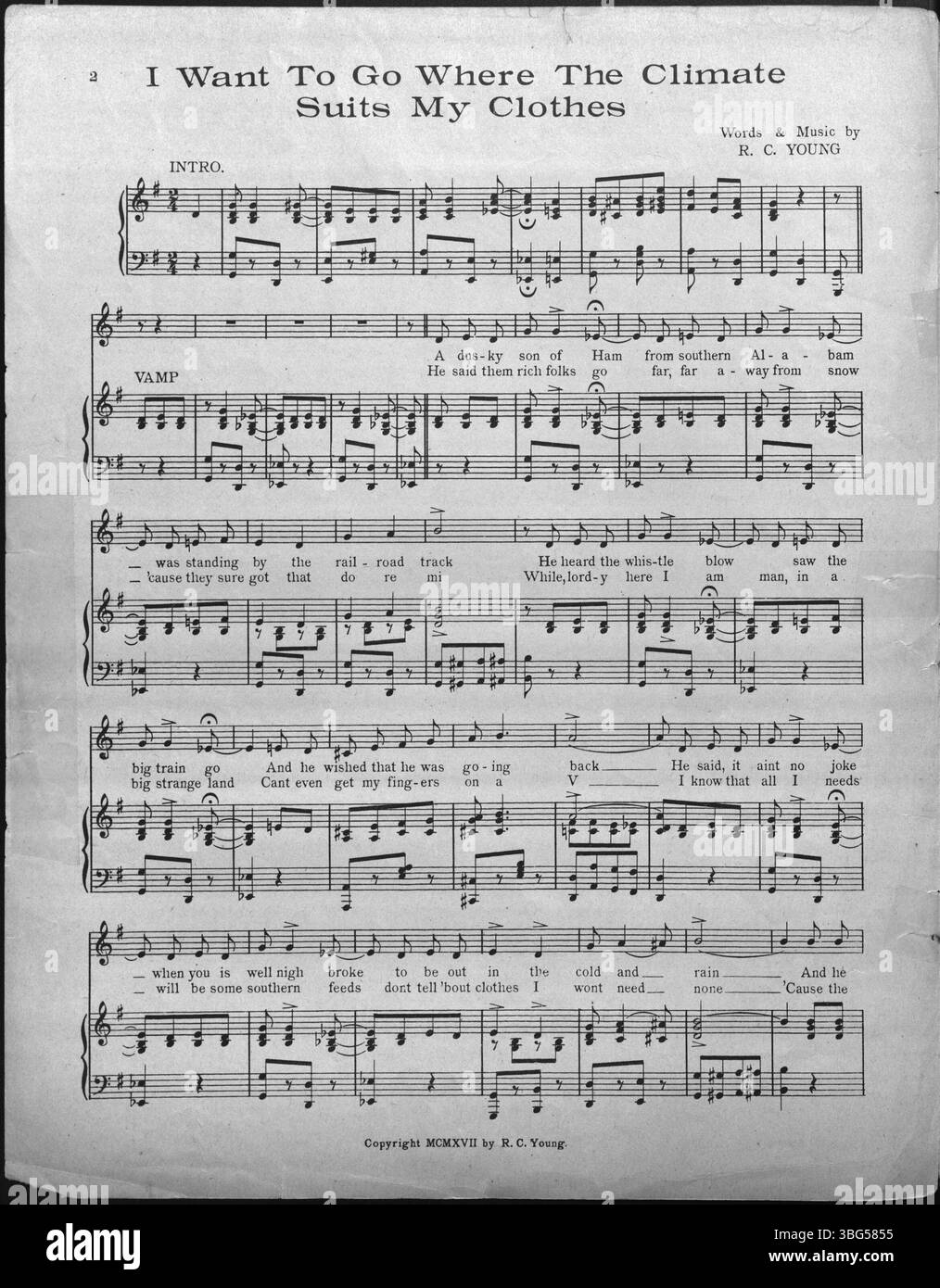 Das Notenblatt für *I Want to Go Where the Climate Suits My Clothes* aus dem Jahr 1917 zeigt eine Kabine mit einer afroamerikanischen Frau im Eingang und einem Kind, das draußen spielt. Stockfoto