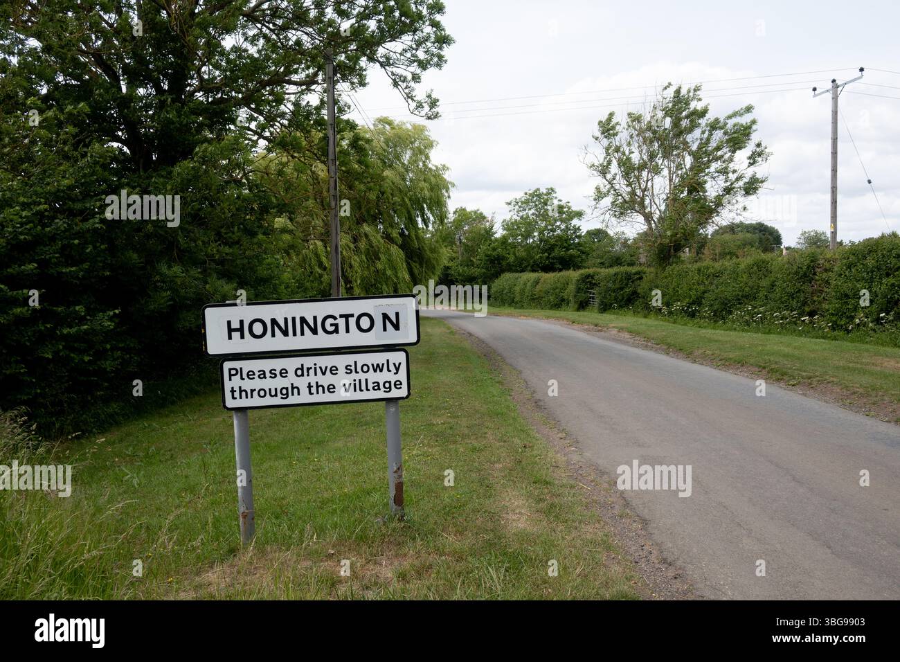 Honington Village Schild, Warwickshire, England, Großbritannien Stockfoto