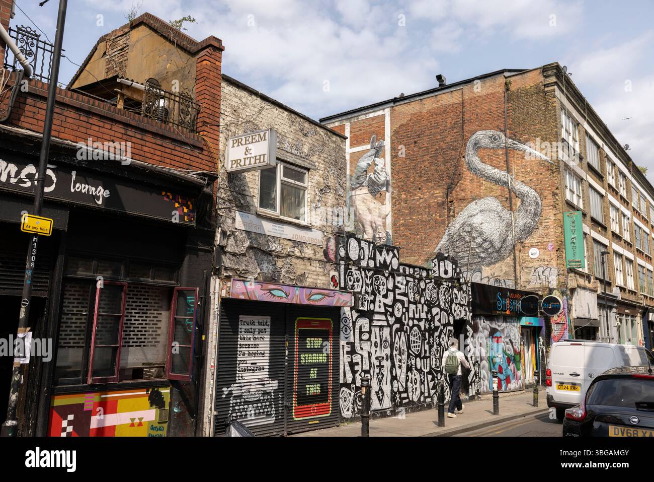 Brick Lane, im angesagten Londoner East End, pulsierende Street Art, Vintage-Läden und vielfältige Gastronomie und historische Bedeutung, England, Großbritannien Stockfoto