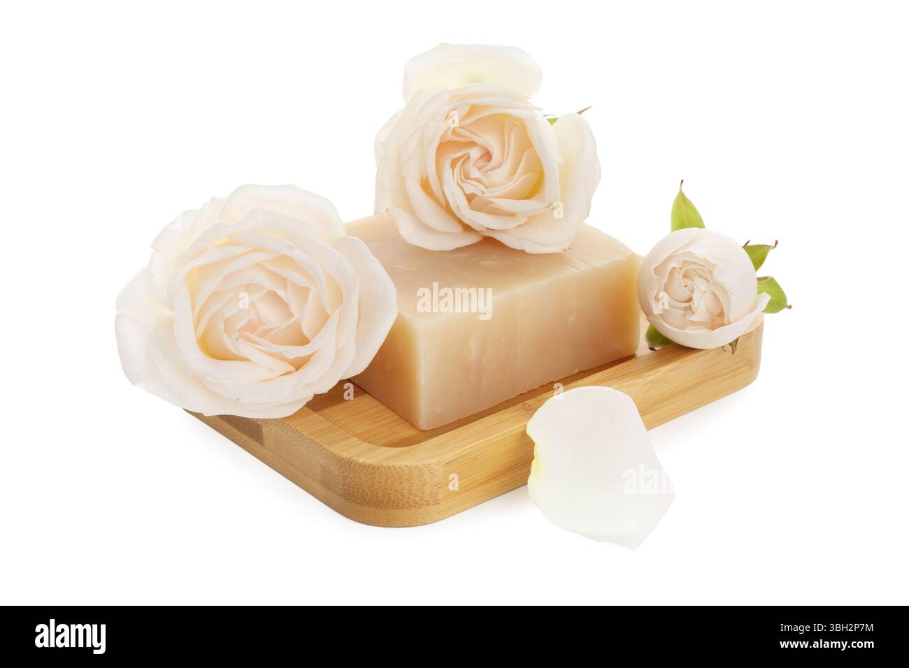 Aromatischer Seifenstab und Rosen isoliert auf weiß Stockfoto