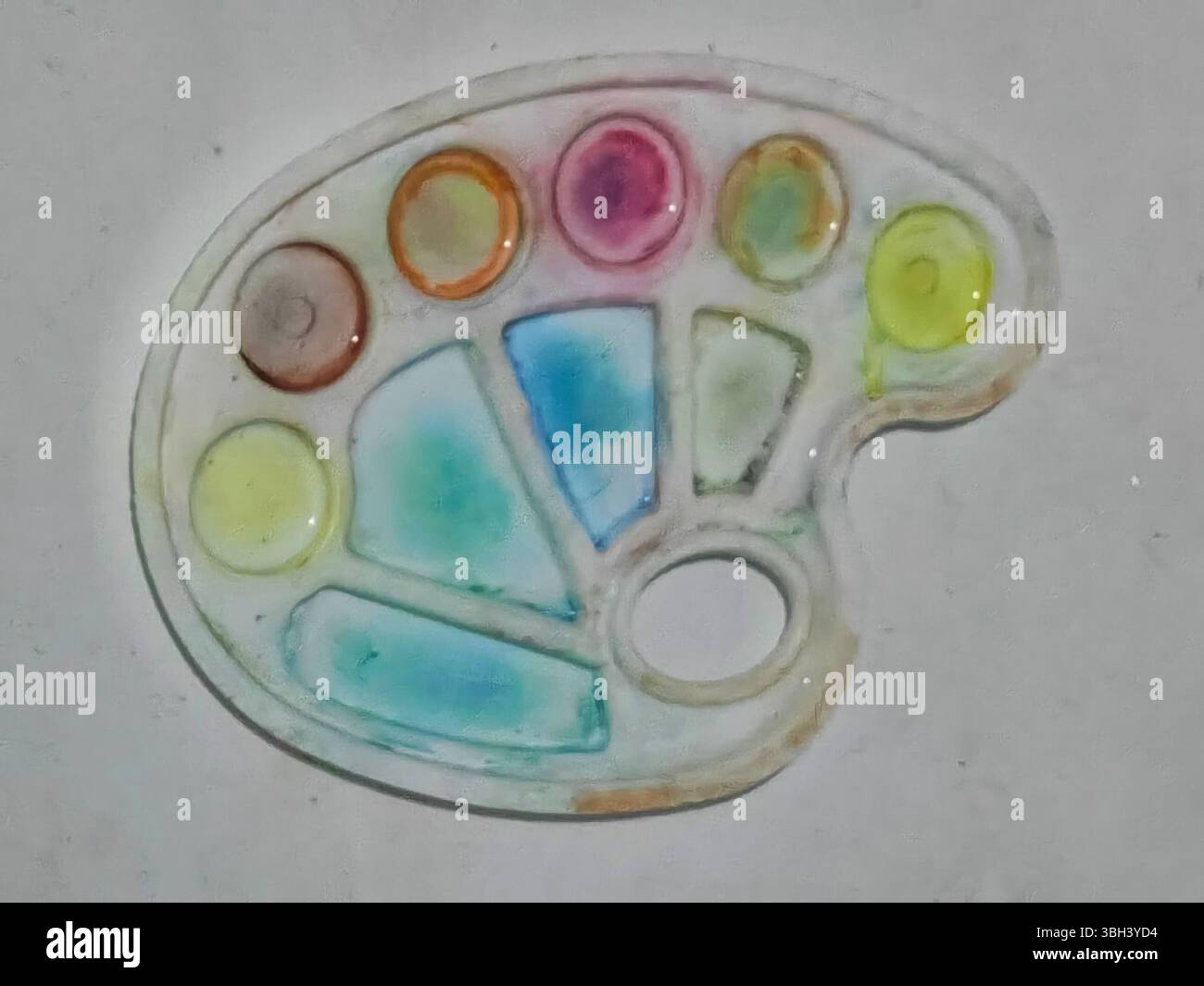 Palette im Fokus. Die Farben Gelb, Blau, Rosa und Orange bleiben erhalten. Stockfoto