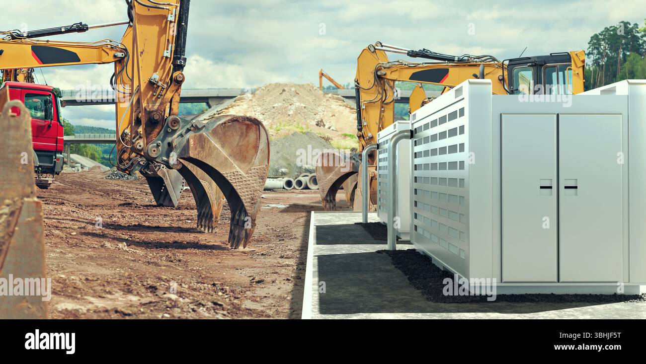 Baumaschinen auf einer Baustelle eines modernen Solarfield mit Batteriespeicher Stockfoto