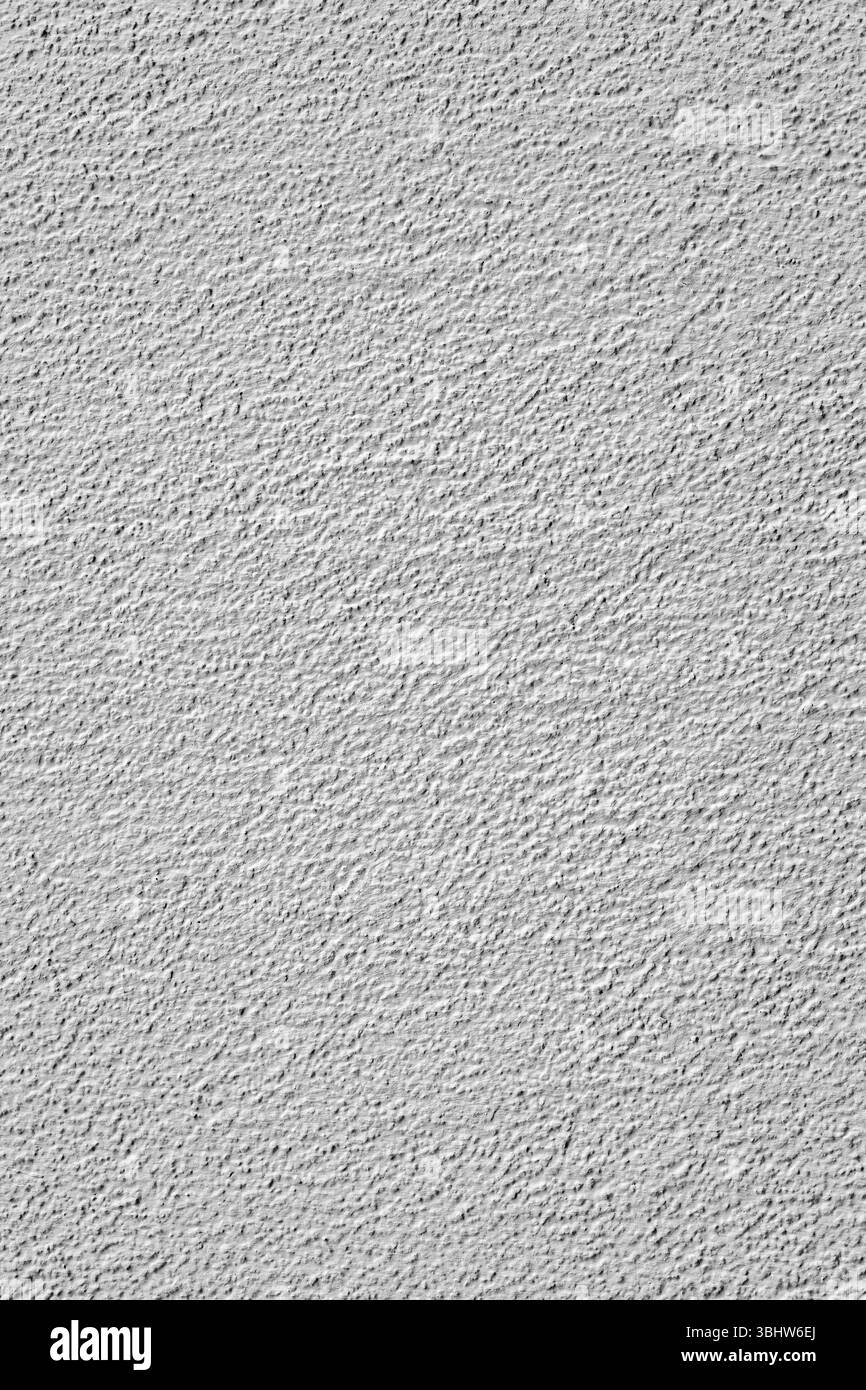 Hintergrund in Form einer verputzten Wand von grauer Farbe, vertikales Foto Stockfoto