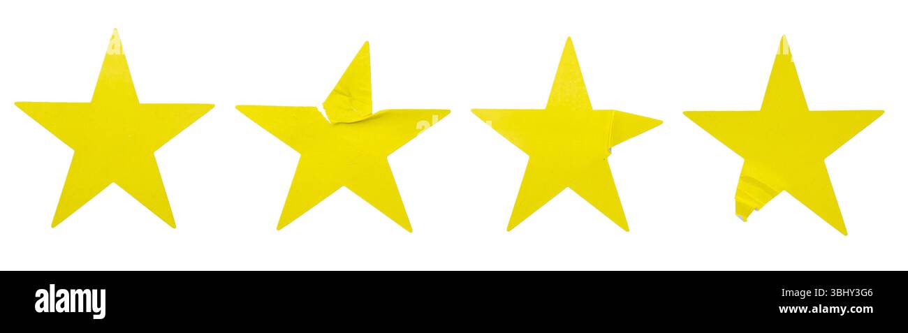 Ein Satz gelber, sternförmiger Papieraufkleber, isoliert auf weißem Hintergrund. Stockfoto
