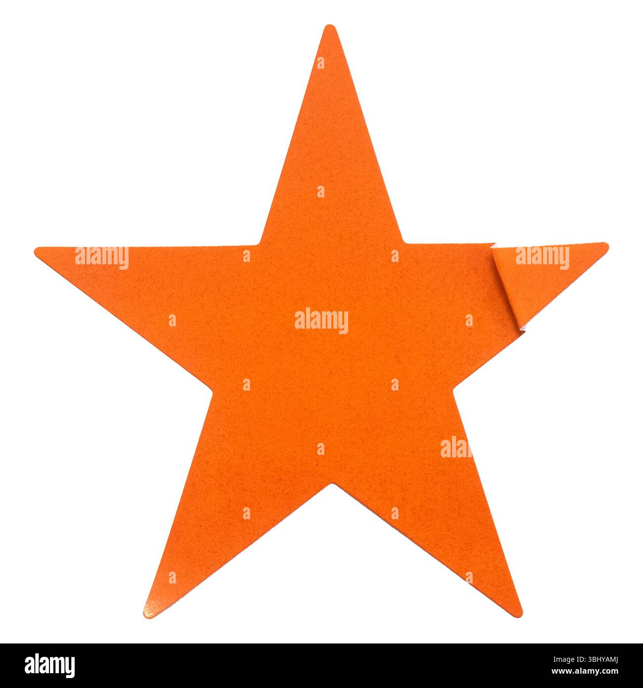 Orangefarbenes, sternförmiges Papieraufkleber isoliert auf weißem Hintergrund. Stockfoto