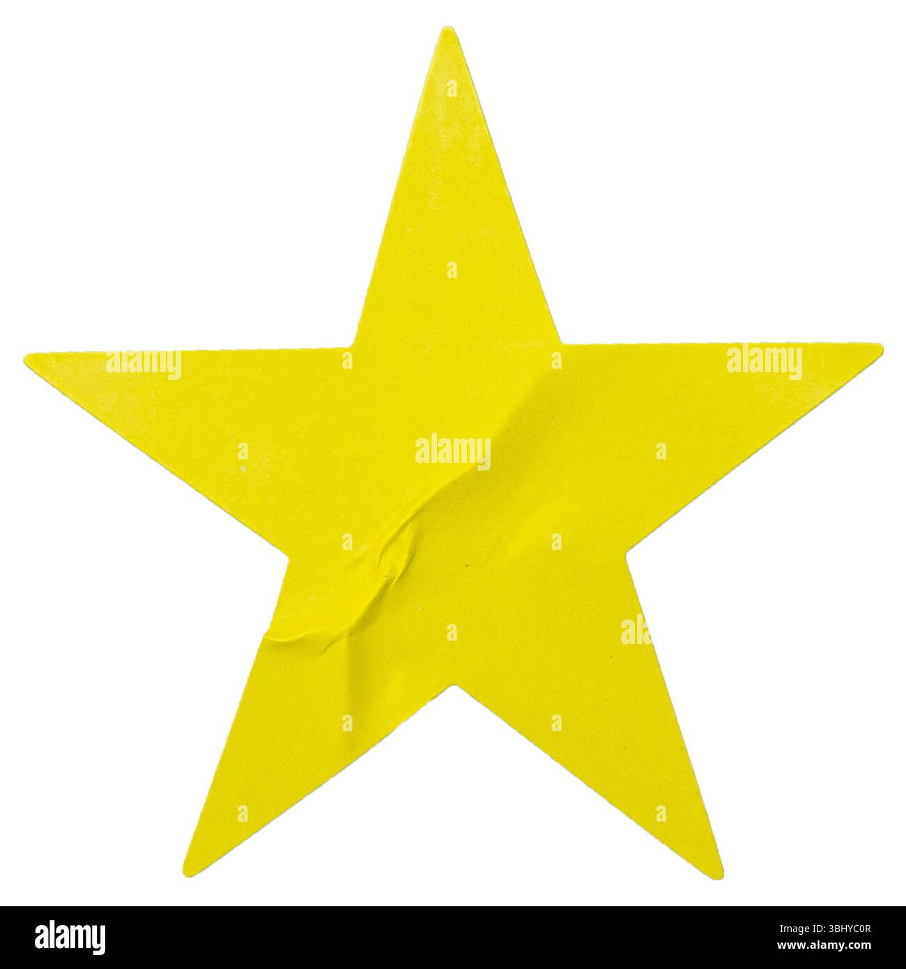 Gelber, sternförmiger Aufkleber isoliert auf weiß. Stockfoto