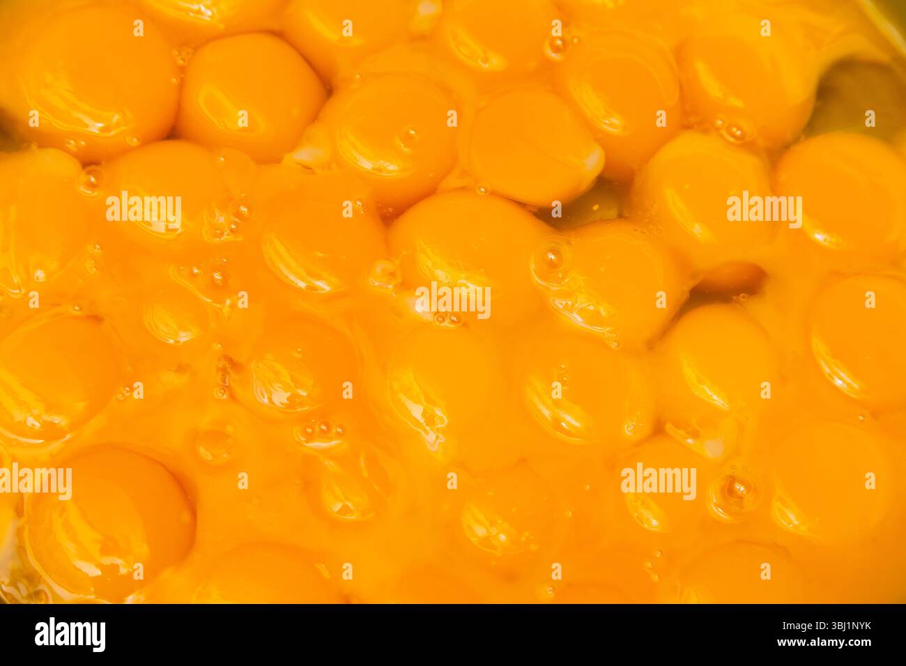 Eigelb Nahaufnahme. Hintergrund von Eigelb. Stockfoto