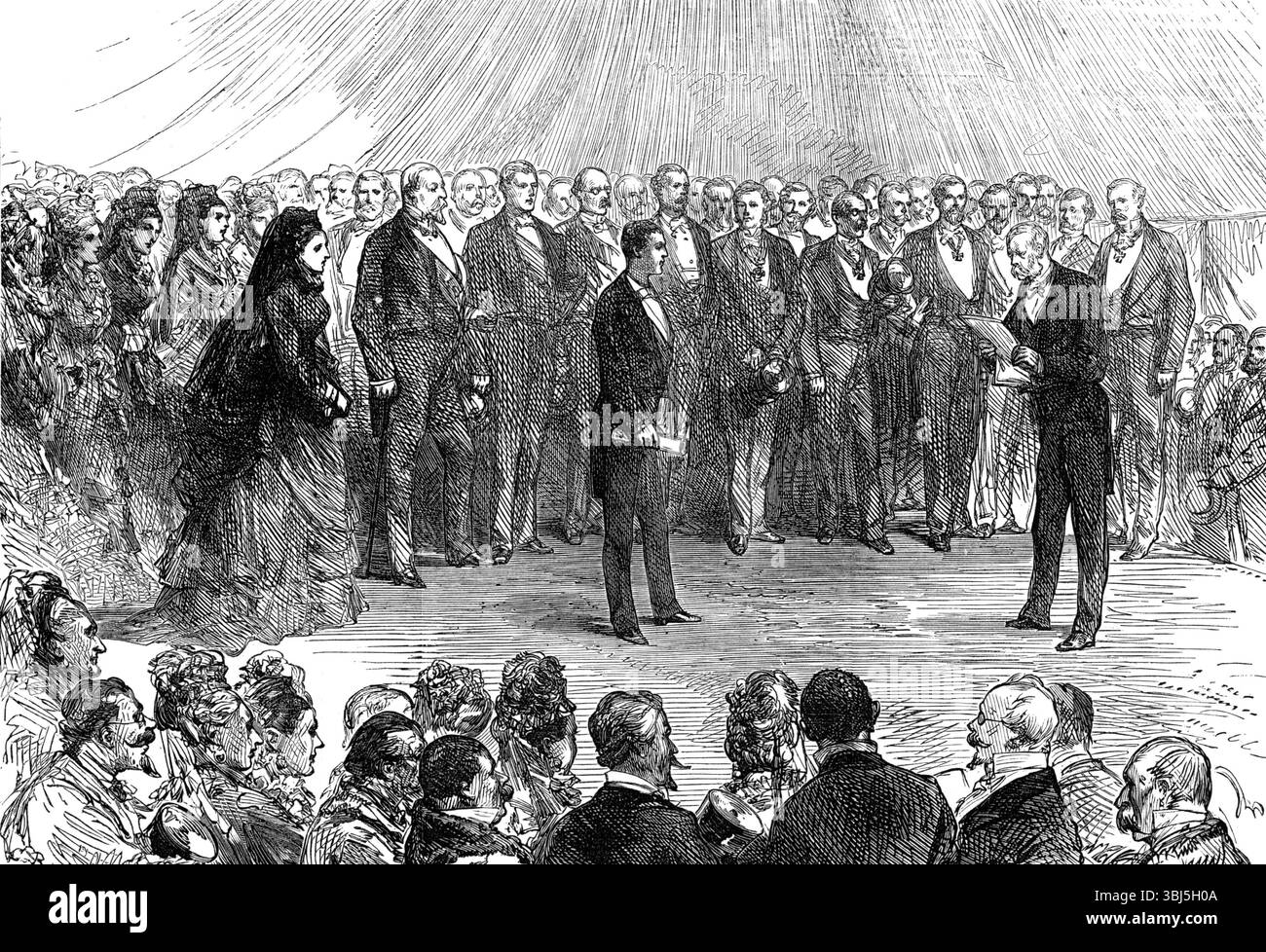 Die Mehrheit des Prinzen Imperial: Der Duc de Padoue liest die Adresse am Camden Place, Chiselhurst [sic], 1874. Zeremonie anlässlich des Erwachsenenalters von Louis-Napoléon, Prinz Imperial (1856-1879), der mit seinen Eltern Napoleon III., Kaiser der Franzosen, und Kaiserin EUGénie im Exil lebte. Einige Nachbarn des Prinzen Imperial in Chiselhurst haben kürzlich ein Geburtstagsgeschenk abonniert, das von Mr. Streeter aus 18, New Bond-Street, vorbereitet wurde. Es handelt sich um einen Bienenkorb in Form eines Tintenständers, der mit Amethystern eingelegt ist und von dem Monogramm „L. N.“ in Rubine und überlagert wird Stockfoto