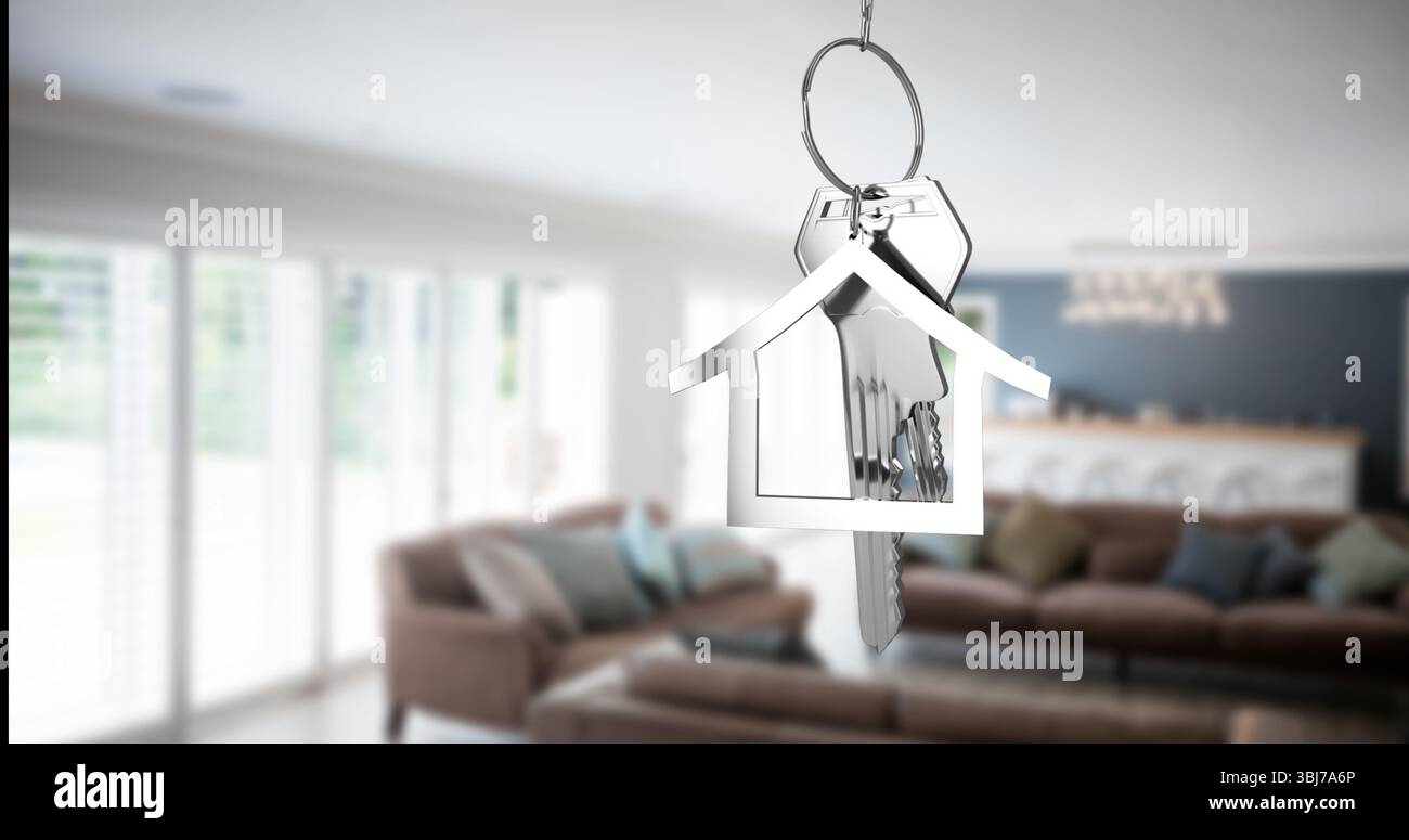 Der Schlüsselanhänger in Metallform hängt in einem modernen Wohnzimmer mit mehreren Metallschlüsseln Stockfoto