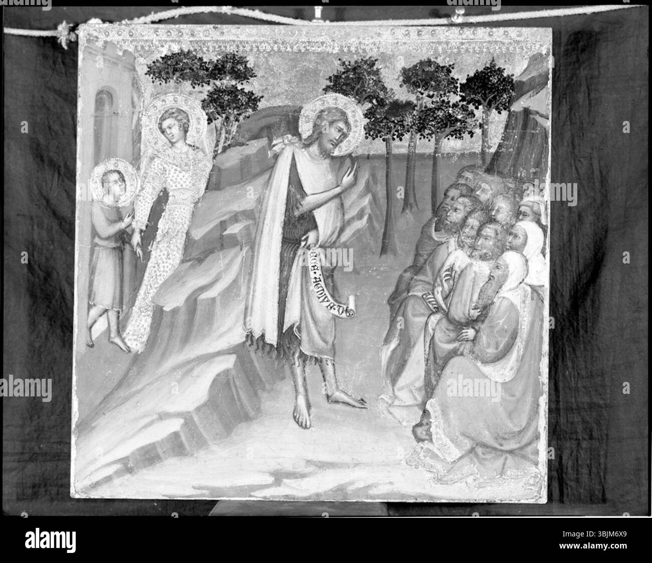 Paolo di Giovanni Fei’s *Heilige Johannes-Predigt* (ca. 1345–1411) ist ein Tempera-Gemälde auf Tafelbildern, das den Heiligen Johannes den Täufer bei der Predigt zeigt. Das Kunstwerk spiegelt den gotischen Stil wider, wobei der Schwerpunkt auf religiösen Themen und detaillierter Ikonographie liegt. Stockfoto