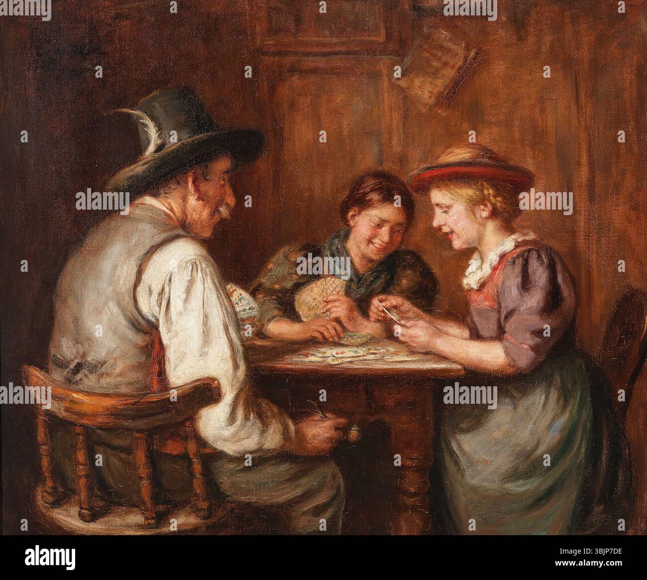 *Kartenspielerinnen* von Emma Müller Edle von Seehof, gemalt 1923, fängt einen Moment der Freizeit mit zwei Frauen ein, die an einem Kartenspiel beteiligt sind. Das Ölgemälde zeigt die intime, häusliche Umgebung, mit detaillierter Aufmerksamkeit auf den Ausdruck der Figuren und ihre Kleidung. Stockfoto