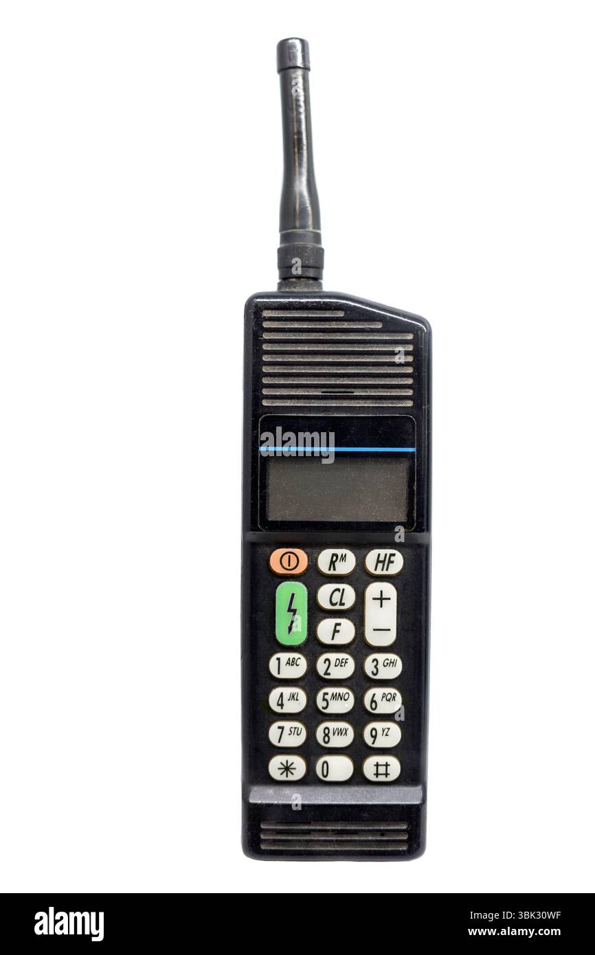Alten Mobiltelefon gegen Weiße isoliert Hintergrund Stockfoto
