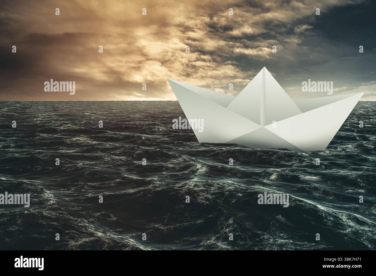 Papierboot schwimmt auf dem Meer Stockfoto