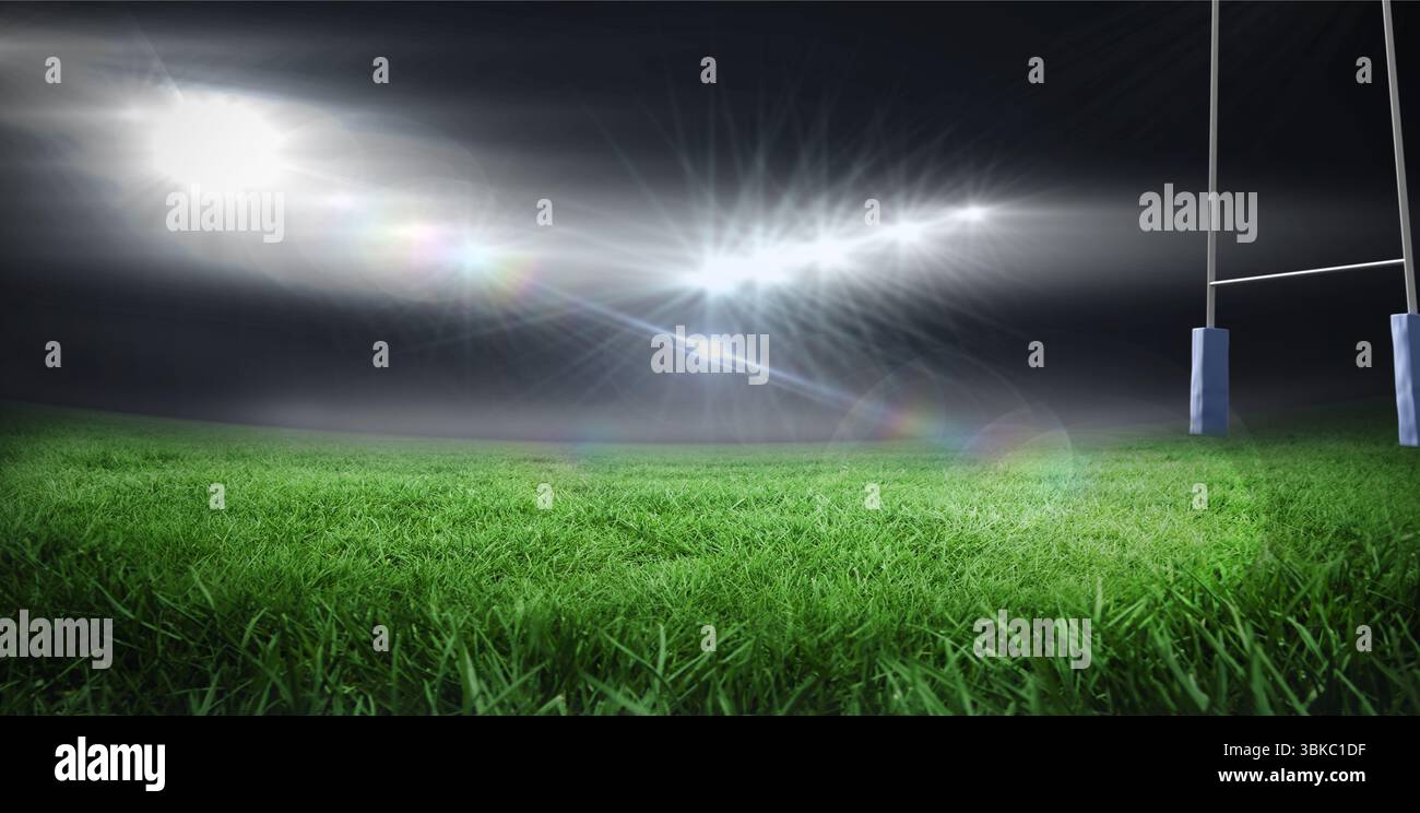Das leere Rugby-Feld leuchtet unter den Flutlichtern in flachem Design, mit Objektivfackeln und Torpfosten Stockfoto