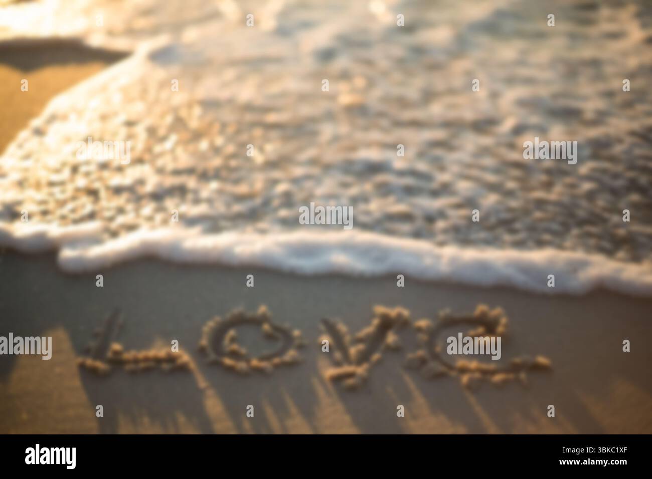 Liebe Text auf Sand am Strand Stockfoto