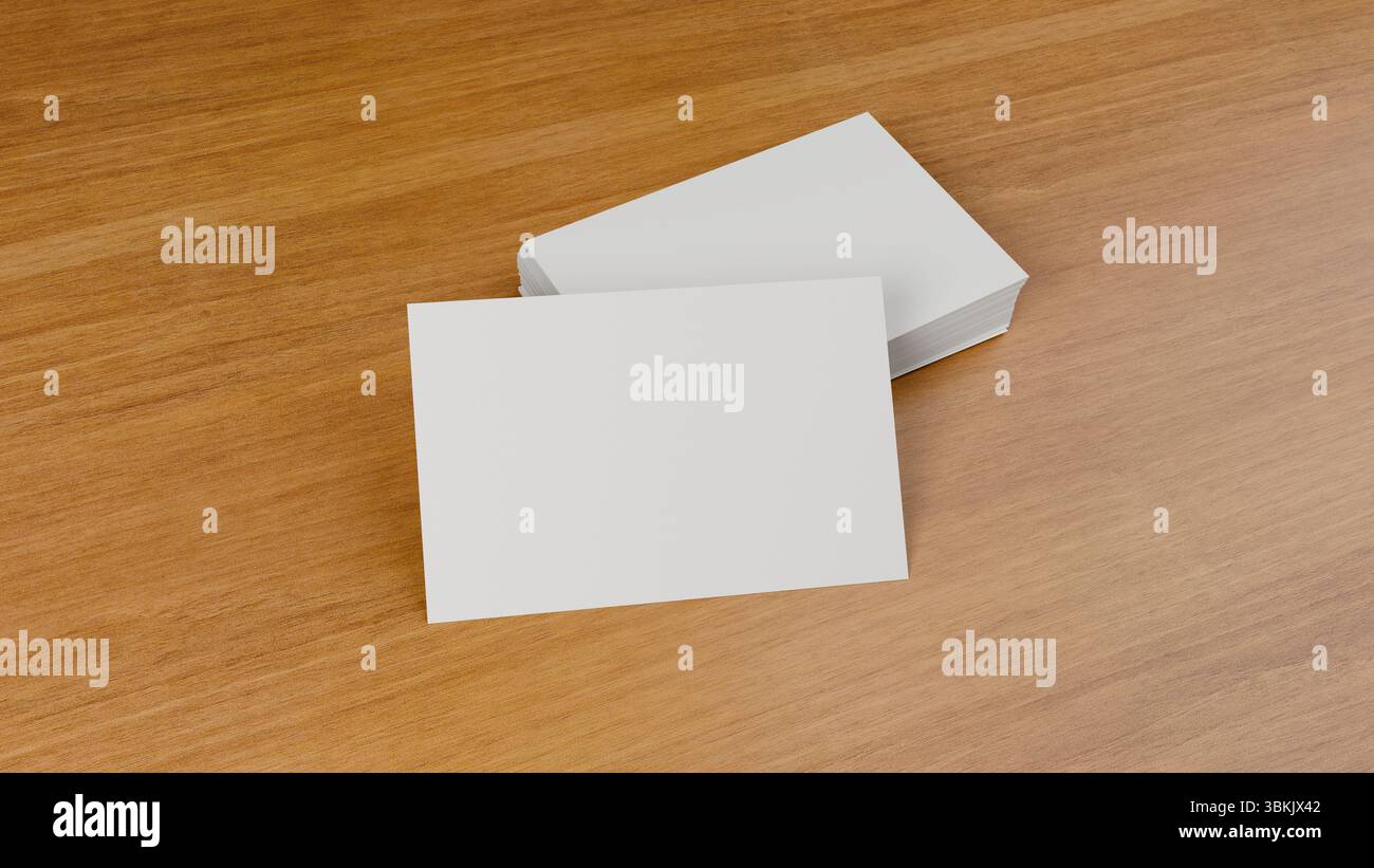 Leere Visitenkarten, ideal für Mockup. Vorlage für Markenidentität. Isoliert über Holztisch. Stockfoto