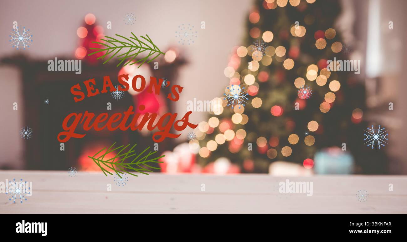 Die Grafik mit den Grüßen der roten Jahreszeit überlagert das Wohnzimmer mit einer Holzplatte und einem Baum Stockfoto