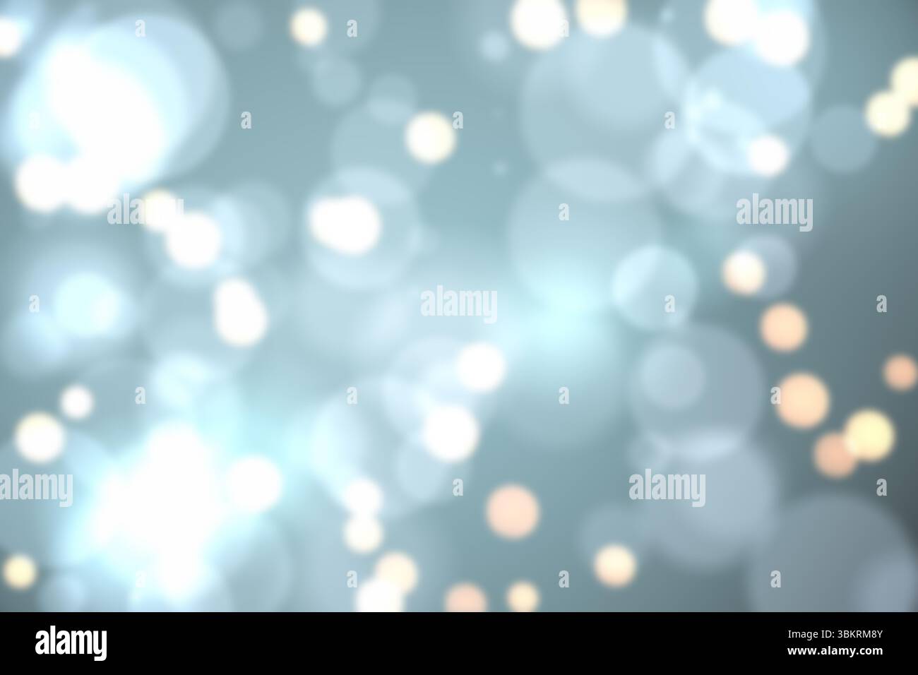 Das abstrakte Bokeh-Muster leuchtet mit überlappenden lichtdurchlässigen Kugeln über einem gedämpften bläulich-grauen Hintergrund Stockfoto