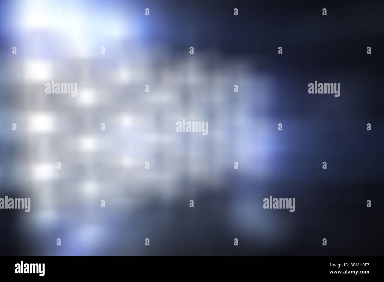 Abstraktes LED-Panel-Raster leuchtet sanft auf dunkler Wand in flacher Bauweise und erzeugt Lichtreflexionen Stockfoto Abstraktes LED-Panel-Raster leuchtet sanft auf dunkler Wand in flacher Bauweise und erzeugt Lichtreflexionen Stockfoto