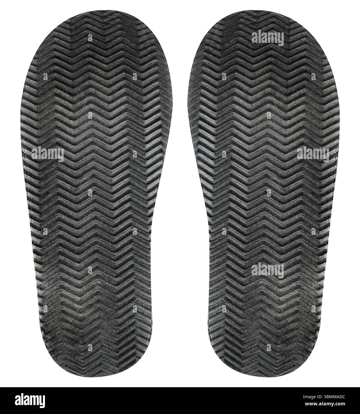 Isoliertes Foto eines schwarz gefärbten Schuhprotektors mit Gummimuster auf weißem Hintergrund. Stockfoto