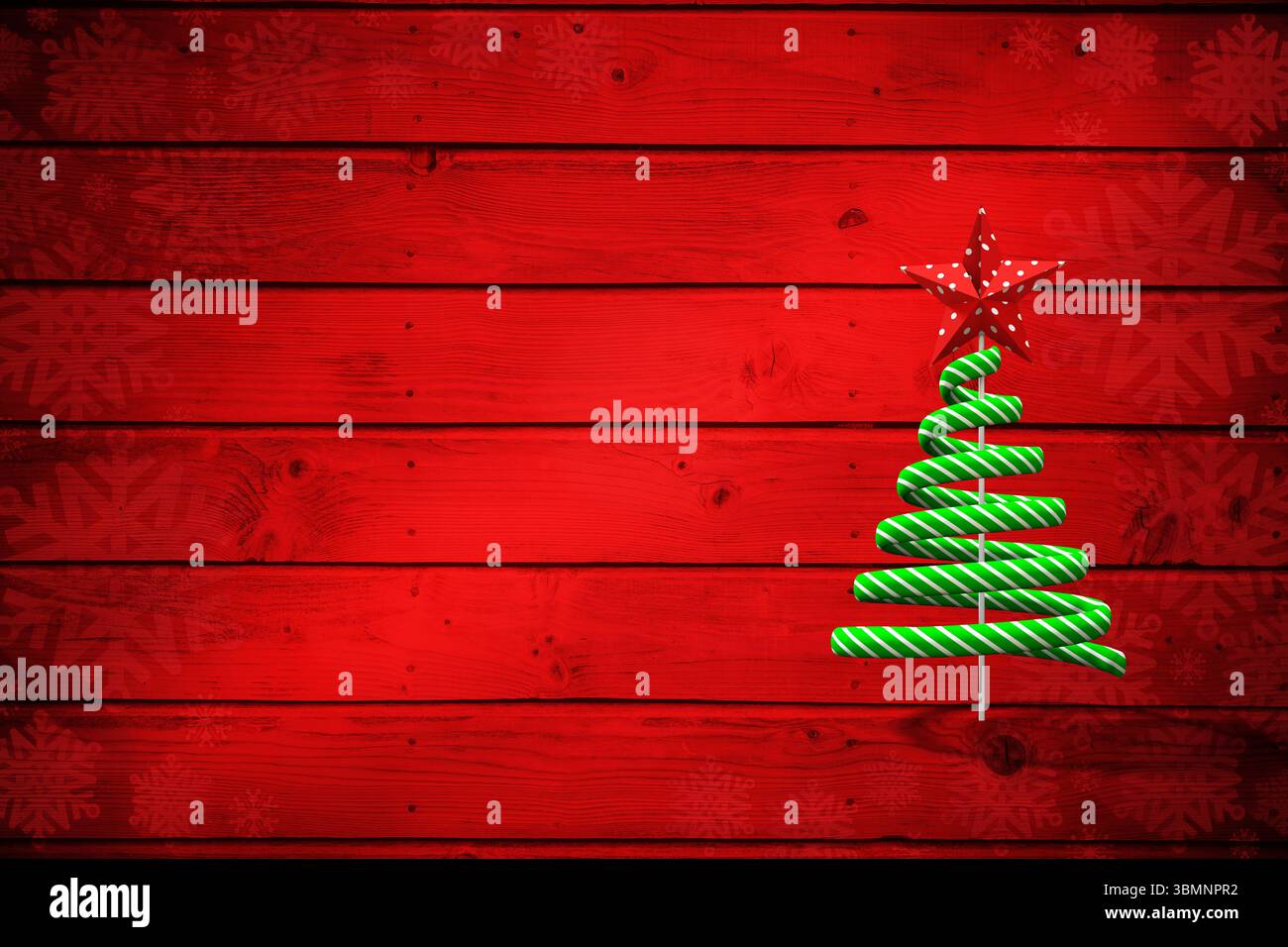 Weihnachtsbaumform auf rotem Holz Stockfoto