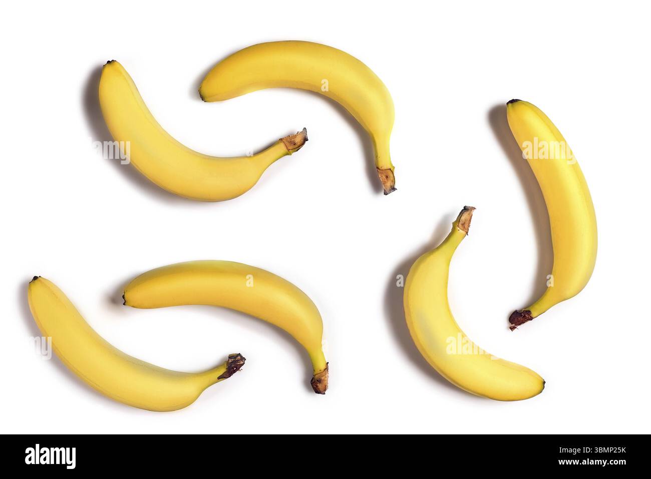 Gelbe Bananen auf weißem Hintergrund Reif. Immer noch leben. Kopieren Sie Platz. Isoliert. Lustiges Bild Stockfoto Gelbe Bananen auf weißem Hintergrund Reif. Immer noch leben. Kopieren Sie Platz. Isoliert. Lustiges Bild Stockfoto