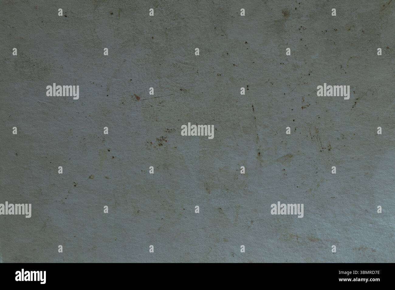 Alte graue Notizbuchabdeckung mit Flecken – verschmutzte strukturierte Oberfläche als Hintergrund oder Textur, grauer Hintergrund Stockfoto