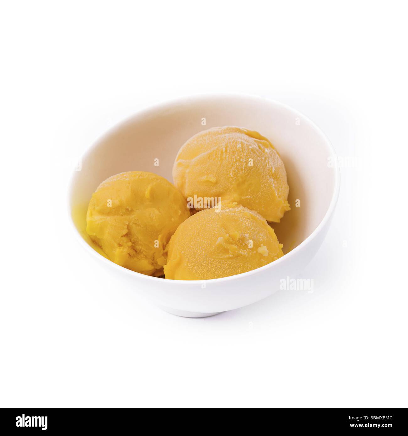 Stillleben, Mangoeis, Sorbet auf einem Teller Stockfoto