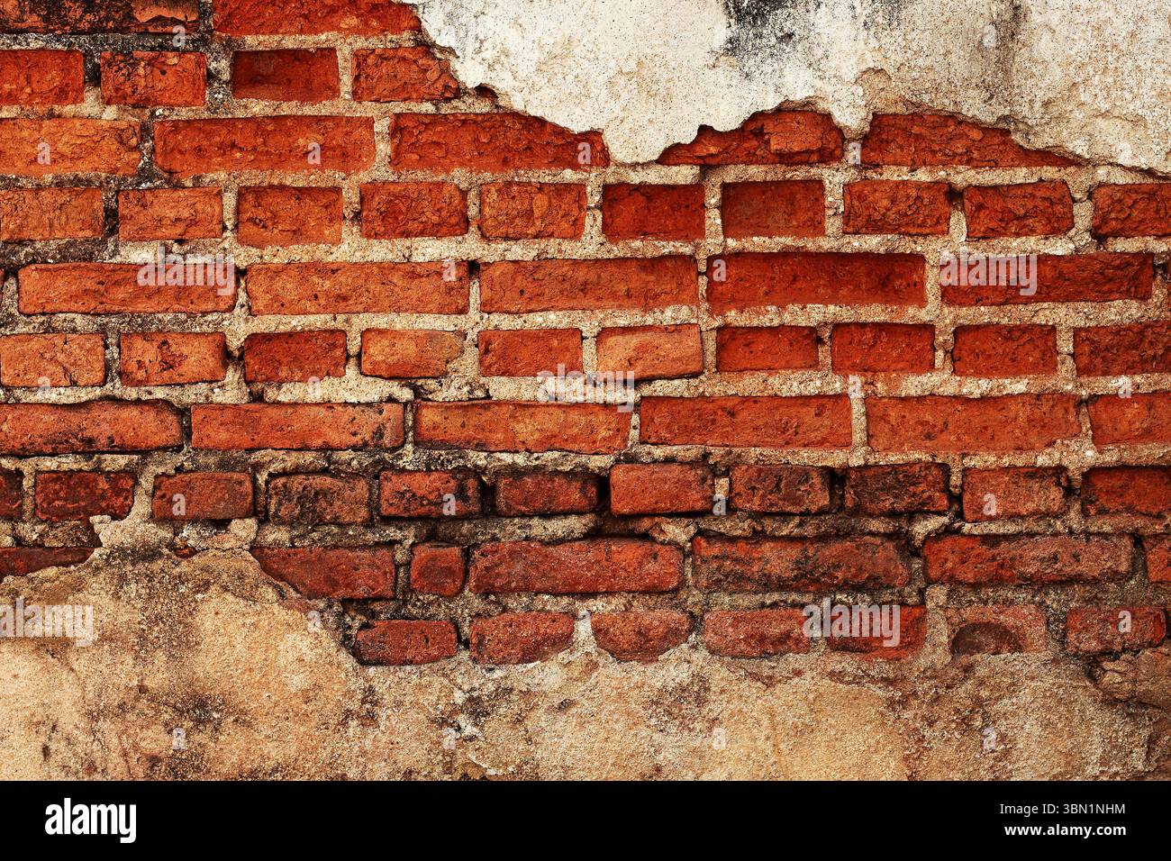 Es ist eine alte Ziegelmauer für Muster und Hintergrund. Stockfoto