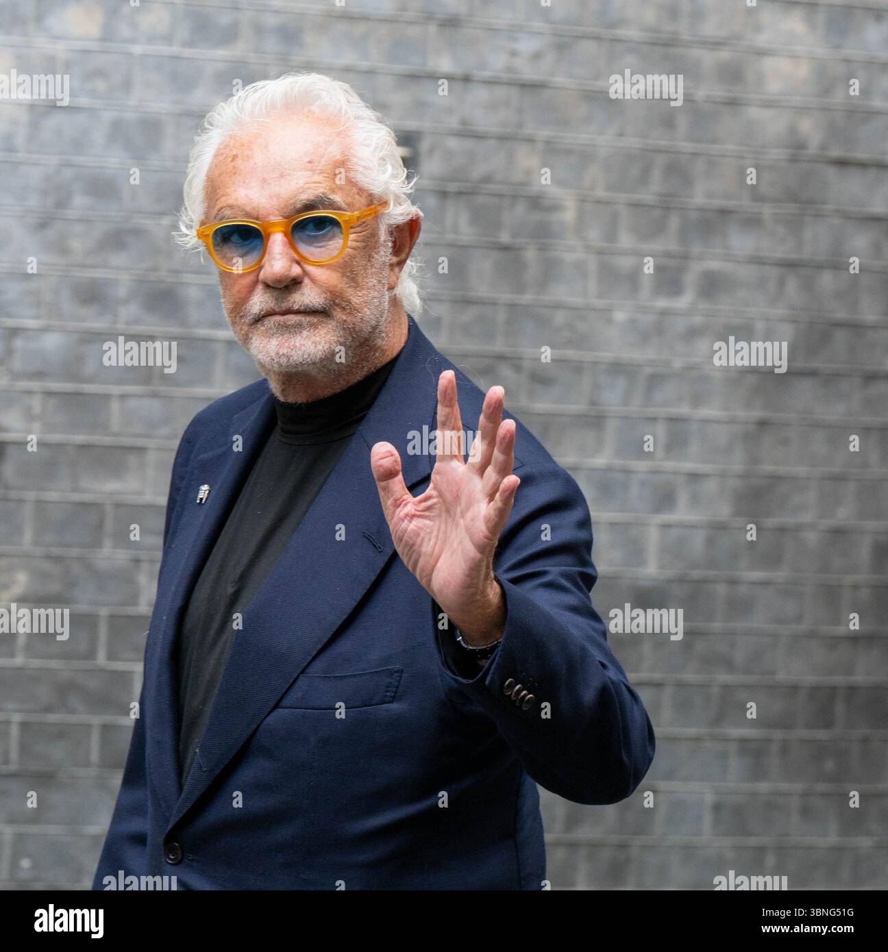 London, Großbritannien. Juli 2025. Besucher des Downing Street Empfangs zum 75-jährigen Bestehen des Sports im Vorfeld des Grand Prix Flavio Briatore an diesem Wochenende Stockfoto