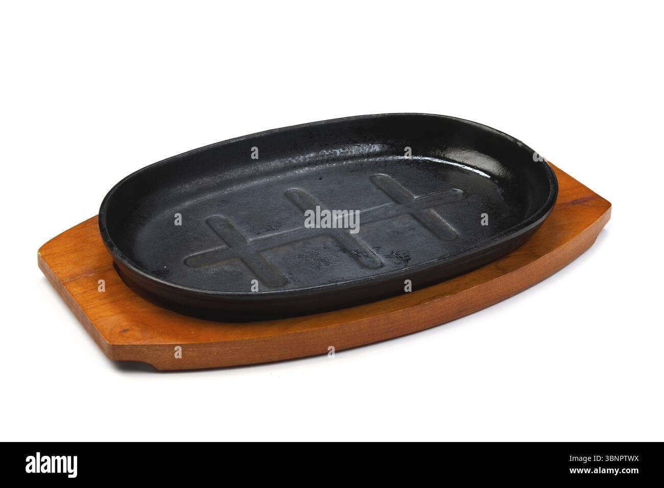 Gusseiserne Pfanne isoliert auf weißem Hintergrund Stockfoto
