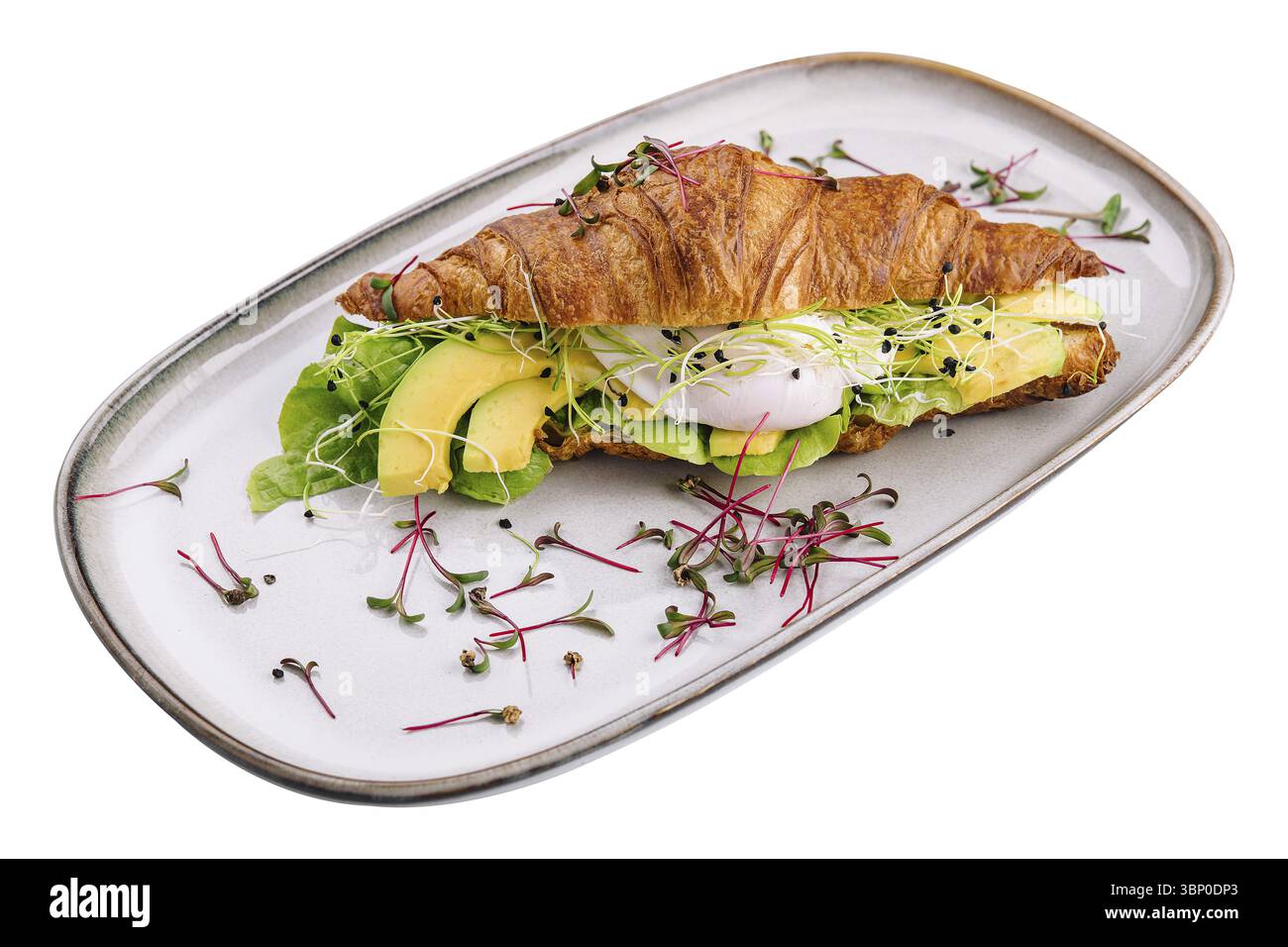 Essen Stillleben, Croissant benedict Lachs mit pochiertem Ei, serviert mit frischem Salat Stockfoto