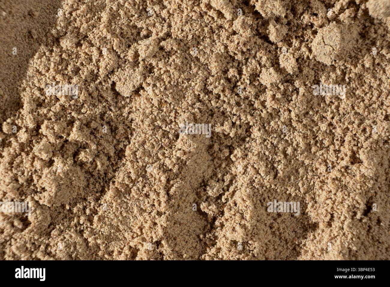 Leinsamenmehl Makrostruktur Draufsicht. Kulinarischer Hintergrund. Stockfoto