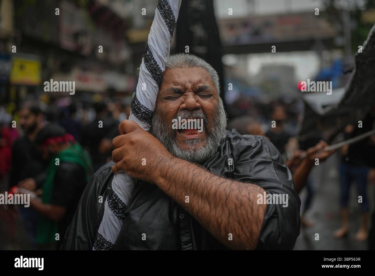 A Shiite Muslim mourns during an Ashoura procession marking the 7th ...