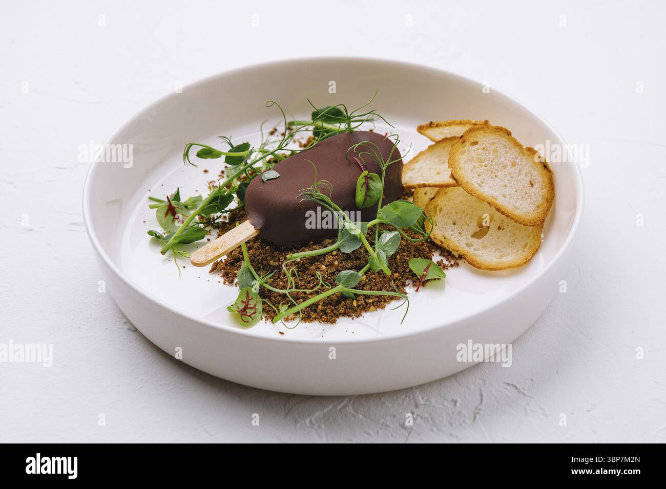Food, Cookie eis auf einem Stock auf Teller Stockfoto