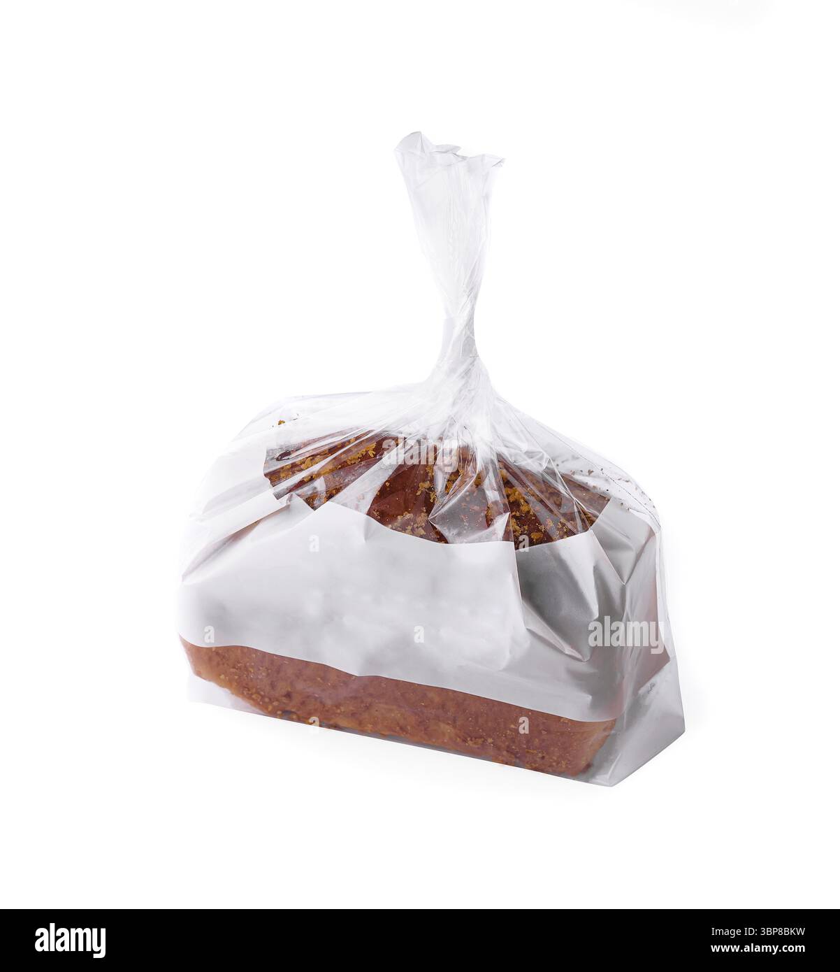 Essen, frisch gebackenes Brot liegt in einer transparenten Plastiktüte mit einem leeren weißen Etikett, bereit für Branding und Verkauf Stockfoto