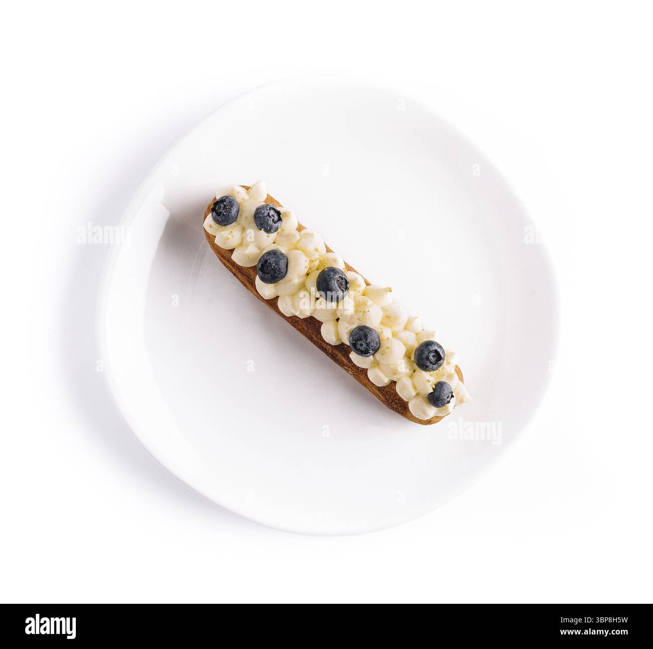 Essen, Eclair mit Vanillecreme und Heidelbeeren Stockfoto