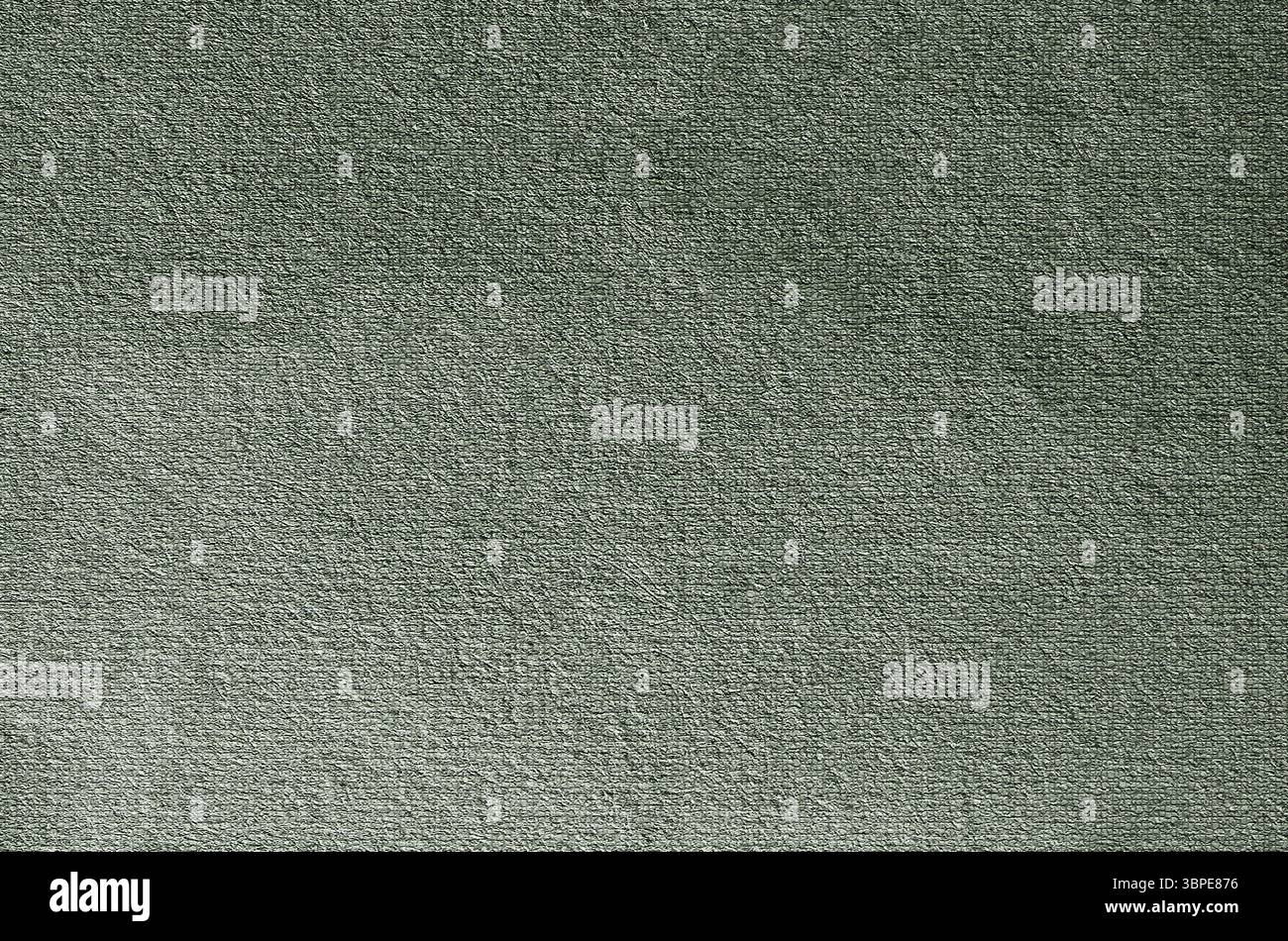 Grüner, strukturierter Hintergrund, der den Rahmen füllt, geeignet für Designprojekte und bietet viel Kopierraum Stockfoto