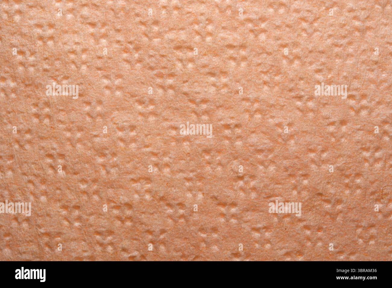 Dezente Muster auf glattem Material erwecken ein Gefühl von Gemütlichkeit und Zuhause. Stockfoto