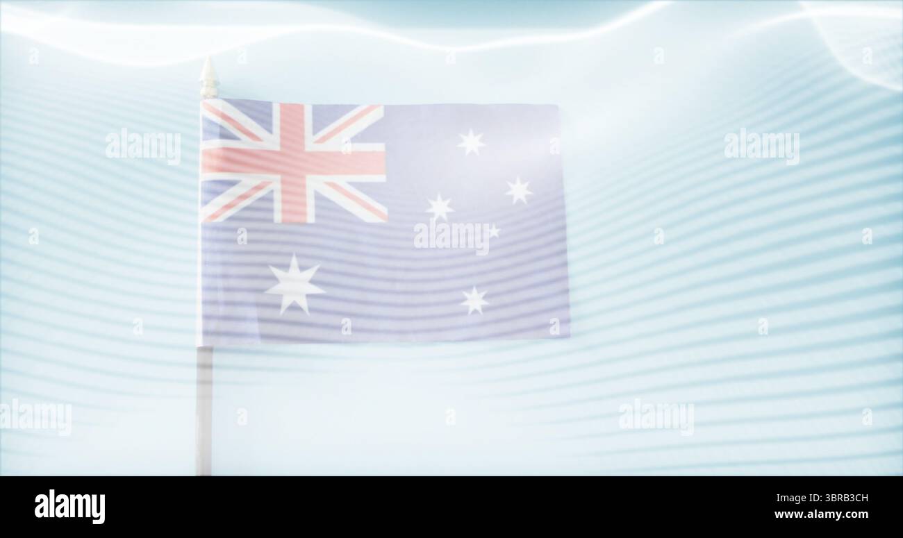 Schwenkende australische Flagge, die sanft am Fahnenmast im offenen Himmel flattert, mit Lichtwellenmuster Stockfoto