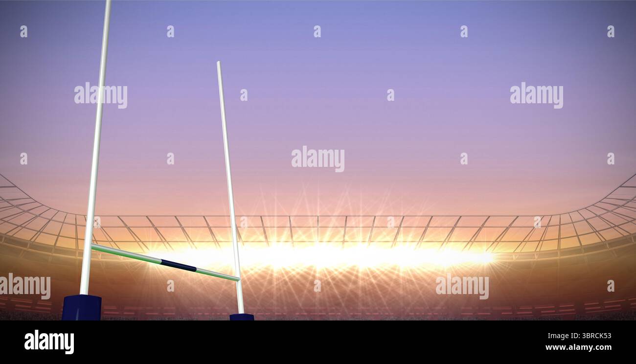 Rugby Torpfosten stehen in einem flachen Stadion mit leeren Sitzplätzen in der Abenddämmerung, die Flutlichter leuchten Stockfoto